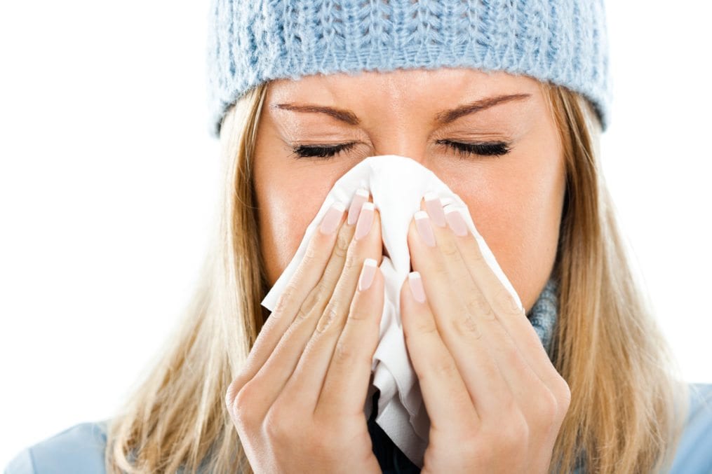 Young woman having flu