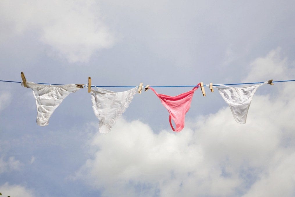 Women's underwear hanging on washing line